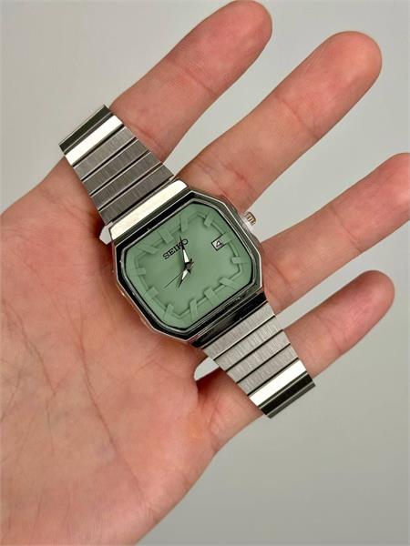 ساعت سیکو مردانه بند نقره ای صفحه سبزروشن - کد 369